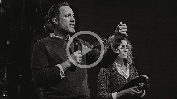 Michael and Lorisa Miller doing communion