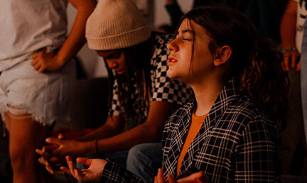 A highschool girl praying